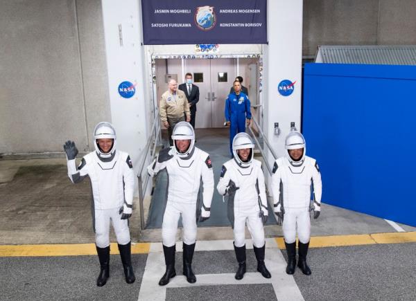 Russian cosmo<em></em>naut Ko<em></em>nstantin Borisov, Danish astro<em></em>naut Andreas Mogensen, NASA astro<em></em>naut Jasmin Moghbeli and Japanese astro<em></em>naut Satoshi Furukawa, (from left), prepare to leave the Operations and Checkout Building early Saturday, Aug. 26, 2023, before heading to the launch pad.