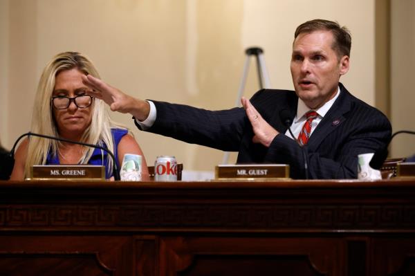 Rep. Michael Guest (R-MS) (R) and Rep. Marjorie Taylor Greene (R-GA) question witnesses during a hearing of the House Homeland Security Subcommittee on Border Security and Enforcement in the Cannon House Office Building on Capitol Hill.