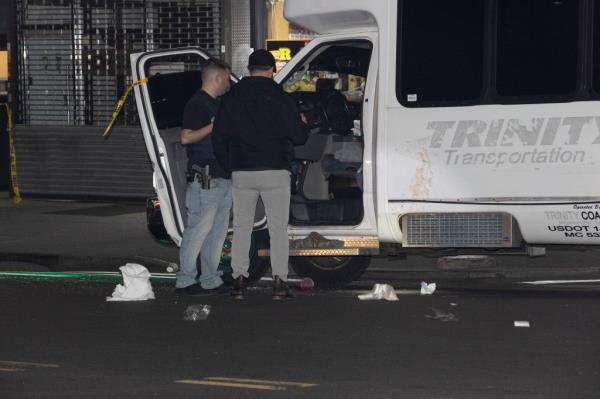 Police at the scene wher<em></em>e the driver of a dollar van was shot in the chest at Flatbush Avenue and Farragut Road Friday night.