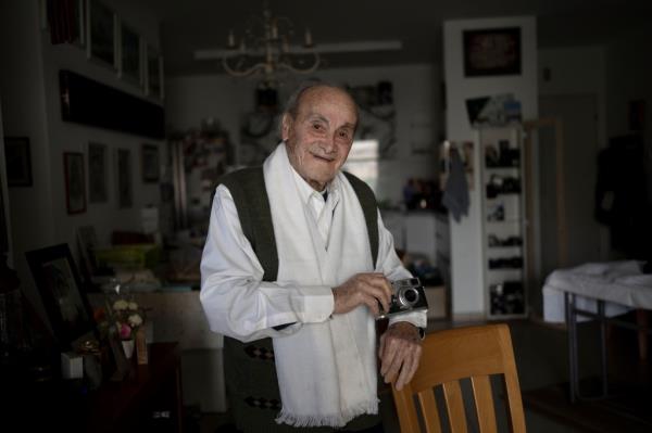 Gad Partok standing in his home