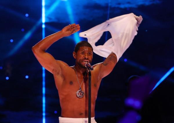 Usher performs during the Super Bowl 2024 halftime at Allegiant Stadium in Las Vegas. 