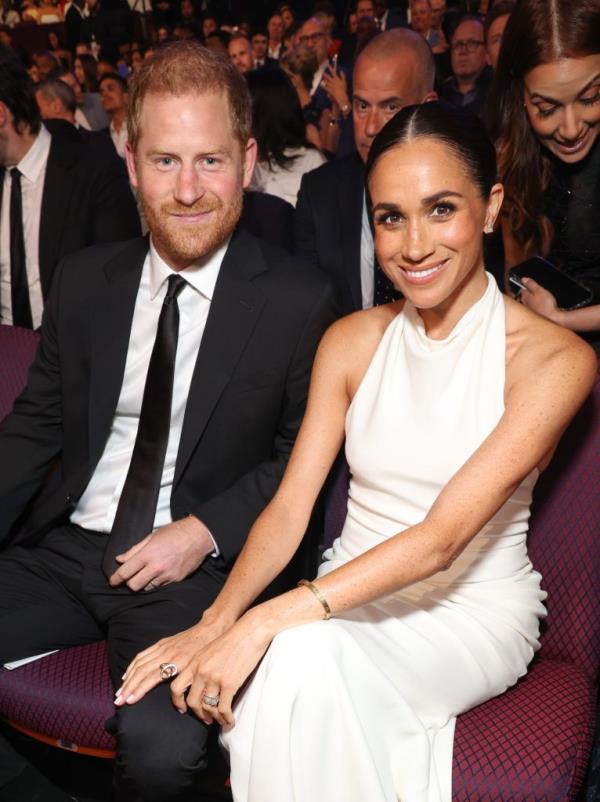 Prince Harry and Meghan, Duchess of Sussex sitting together at the 2024 ESPY Awards in Hollywood, California