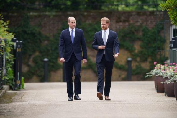 Prince William and Prince Harry unveiling a statue of their mother, Diana, Princess of Wales, at Kensington Palace