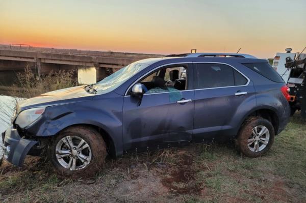 The 49-year-old's dented car after it was recovered from the canal. 